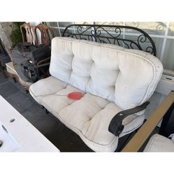 Patio Bench It  Folds The Arm On Come With Sun reels White Cushions IRight Side Is Cones With 2sunbrella White Cushions Weight Iron Lose Can Be Fixed 