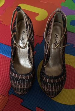 Like New worn once. Multi color stilettos