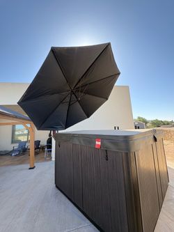 Brand new heavy duty black spa umbrella with 360 degree span