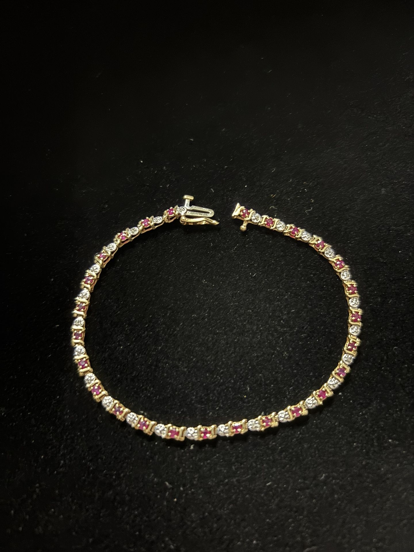 10k Yellow gold Tennis bracelet with natural Rubies 7”