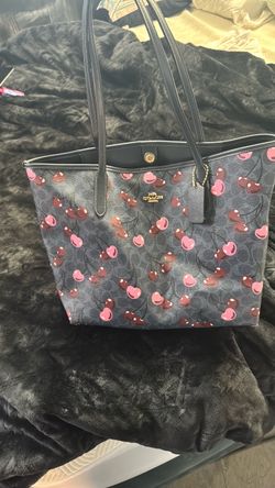 cherry coach purse $200