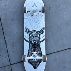 Sovrn Skateboard With Primitive Griptape
