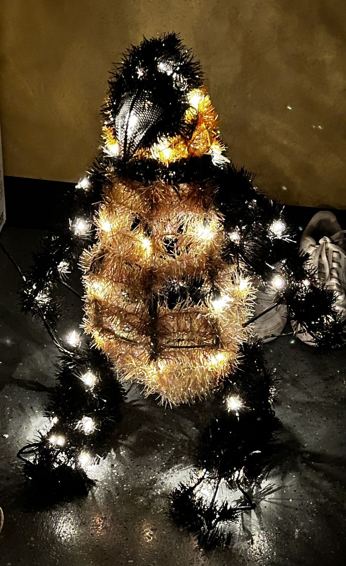 Outdoor holiday decor set up three penguins