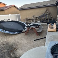 Free 2 trampolines 1 old swing set 1 wooden bench