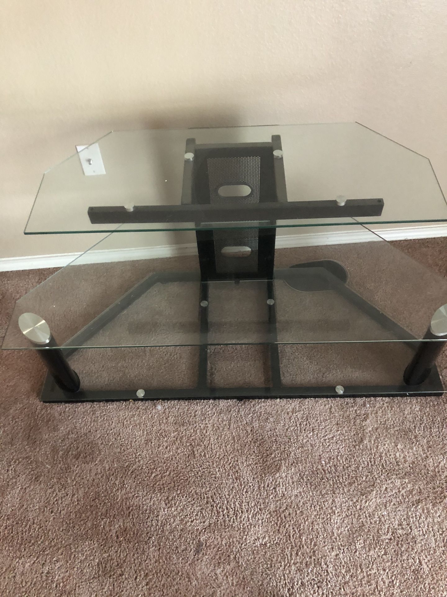 Tv stand with three glass shelves