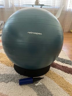 Exercise ball with base and pump
