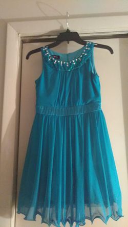 Beautiful teal green granddaughter dress worn only once Easter now to small paid 40 $ at Macy's selling for $ 30 or 5 $ less