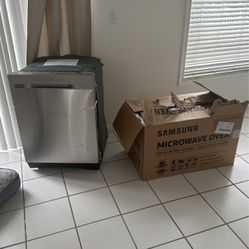 BRAND NEW NEVER USED DISHWASHER AND MICROWAVE