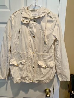 White with gold jacket.