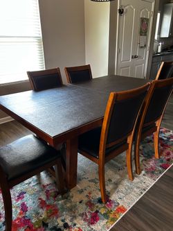 Dining room table and 6 chairs