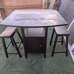 Solid wood drop leaf pub table and bar stools