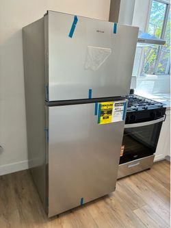 Whirlpool 30 in. 19 cu. ft. Top Freezer Refrigerator in Fingerprint Resistant Stainless with Total Coverage Cooling, Model # WRTX3119SZ