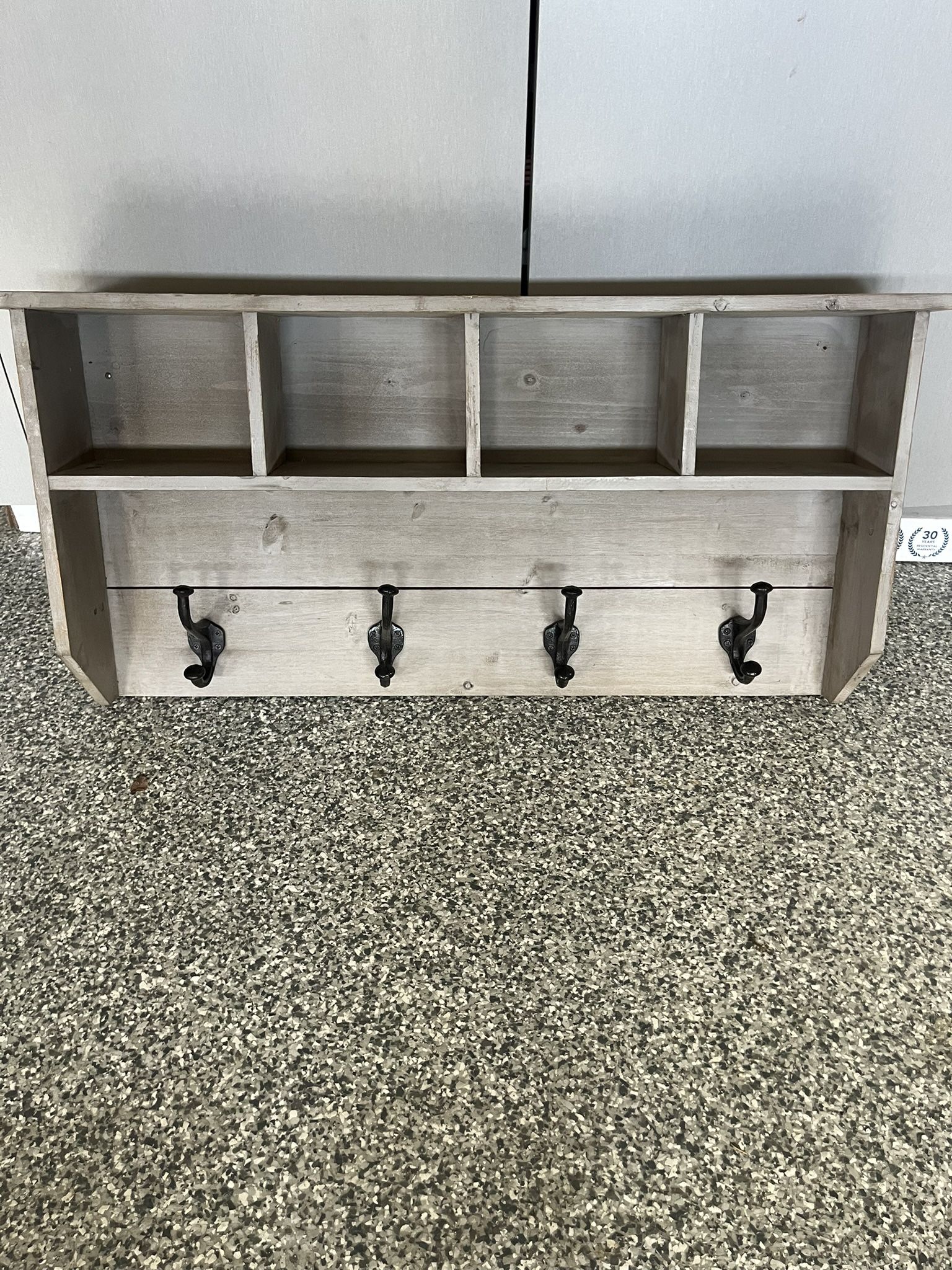 Wall shelf with hooks