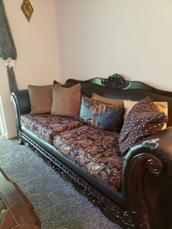 Beautiful sofa and chair from mores furniture excellent condition minor peeling on arms