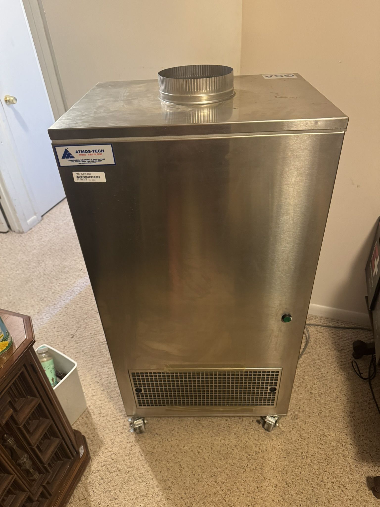 Air scrubber for pathogens like measles