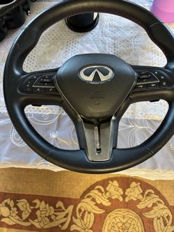 Infiniti Q50 Steering wheel and airbag
