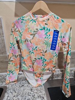 Billabong swimwear in size L (14/16).