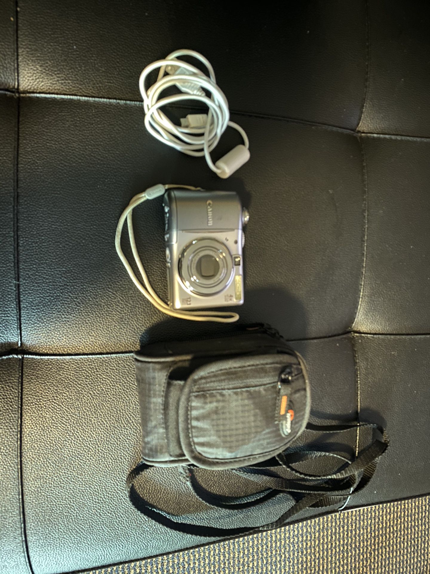 grey canon digital camera
