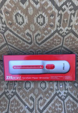 Handheld paper shredder