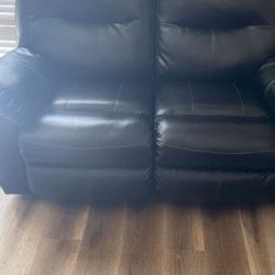black leather recliner sofa