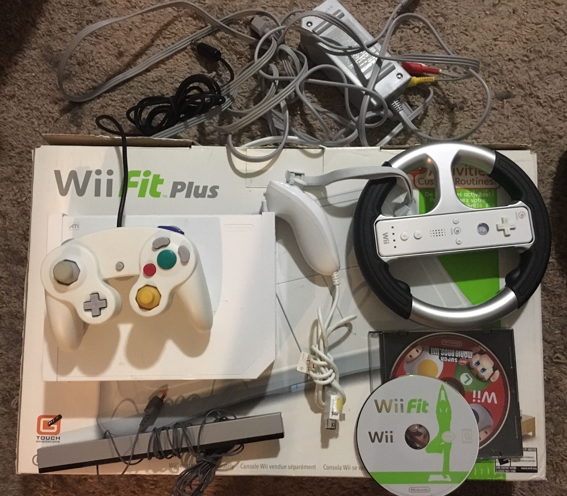 Nintendo Wii with Wii fit plus and more