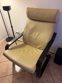 Ikea leather armchair and ottoman