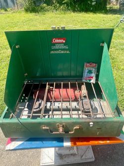 CAMPING STOVE COLEMAN  2- BURNER,  COMES WITH GALLON OF FUEL. USED GOOD CONDITION. WILL DEMO . ELMHURST, IL. 60126