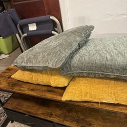 Two Sets Of Pillows 