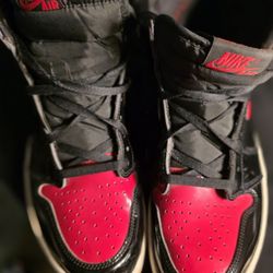 Black and red Jordan shoes