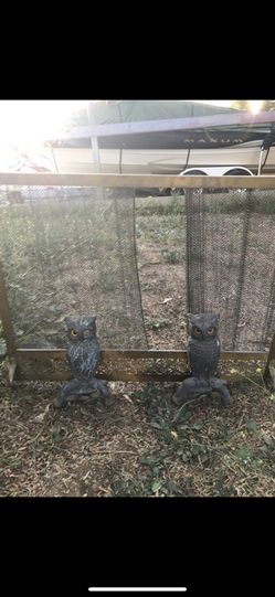 Fireplace grate and antique owl glass eye fire dogs