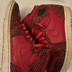 Nike Air Jordan 1 Retro High 'Red Elephant' sneakers. 