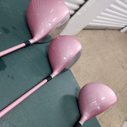 3 Lefthanded womens golf club drivers...1, 3, 5 wood....pink