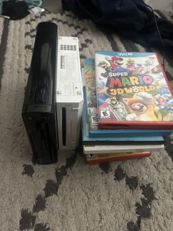 Wii U black and white consoles 2+. And Games