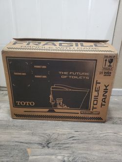 Toto drake toilet tank  washlet and auto flush