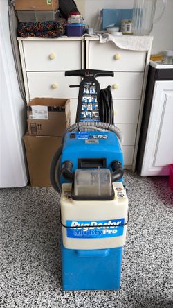 carpet extractor / carpet cleaning machine called the Rug Doctor Might