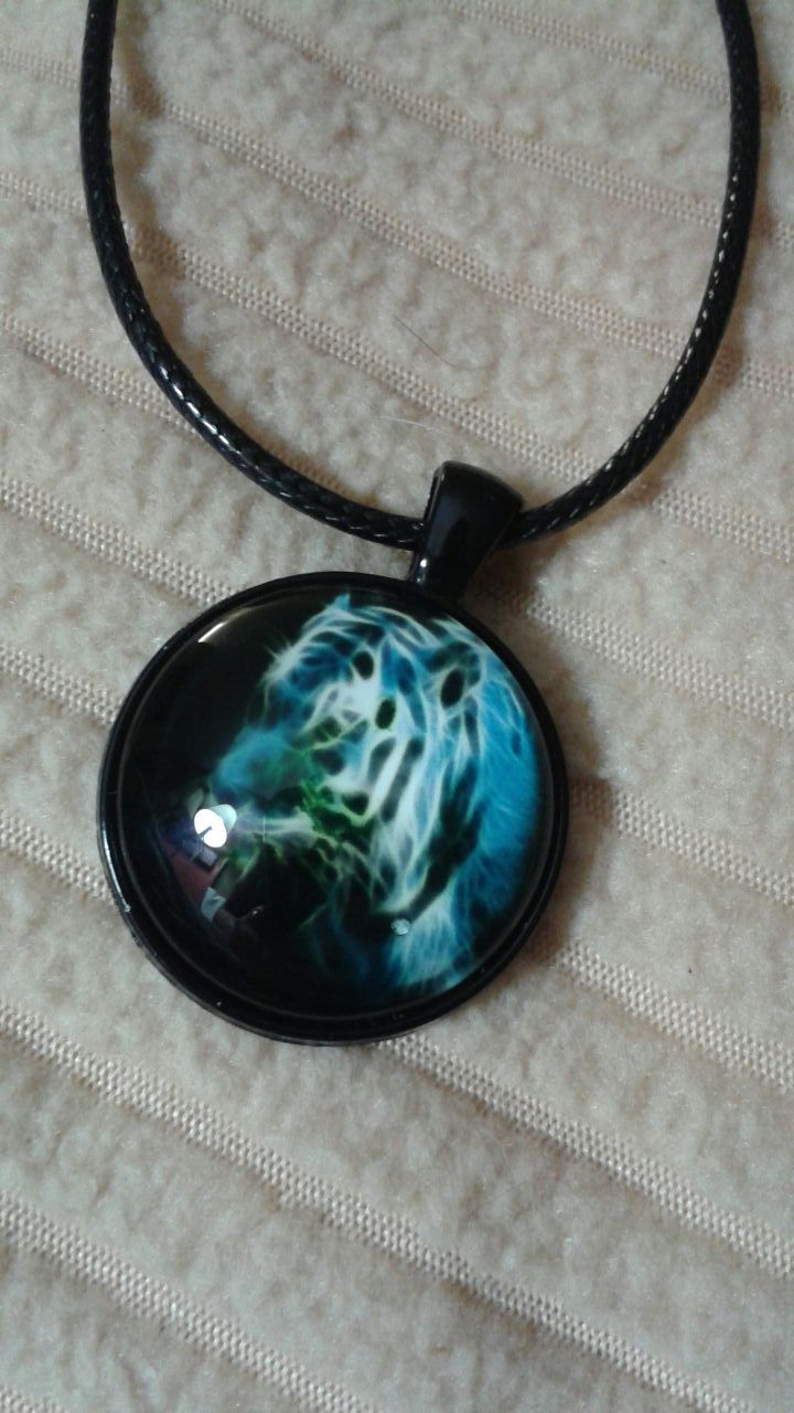 Tiger pendant, leather necklace