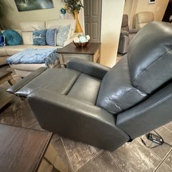 Beautiful power , rocking recliner chair in excellent condition with power headrest