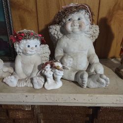 Beauitful Big Angle With Her Other Angles Beside Her