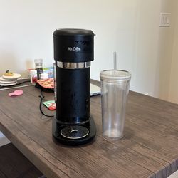 https://offerup.com/redirect/?o=TXIuY29mZmVl with a cup