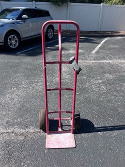 Red steel 2 wheel dolly hand truck good shape