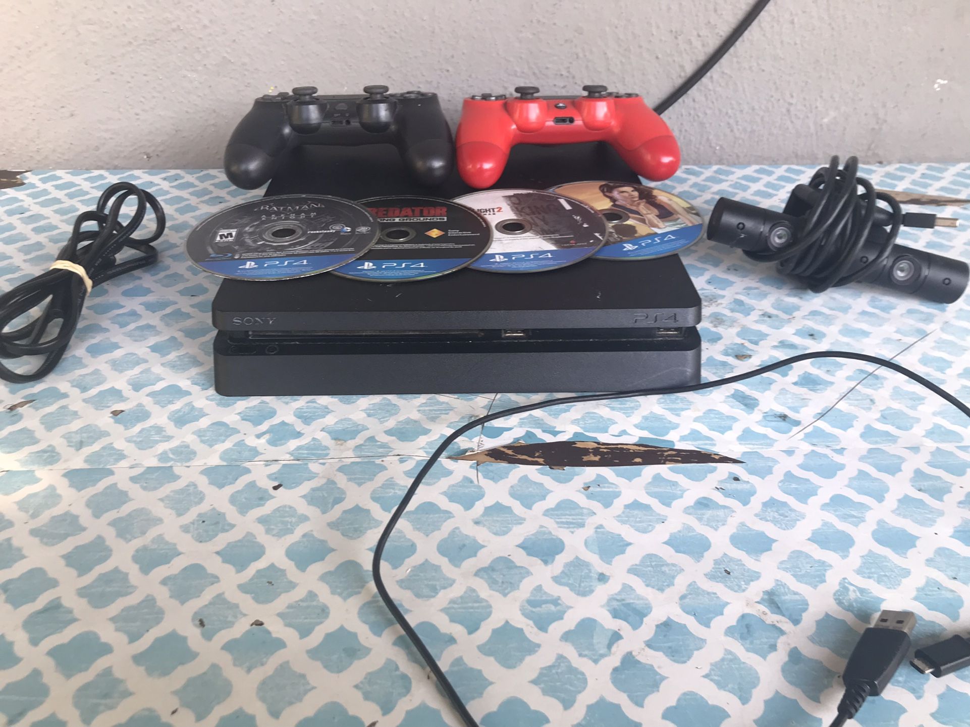 Ps4 Slim, 1TB, 4 Games, 2 Controllers, 1 Camera, 1 Power Cord, 1 Charger And No HDMI Jo