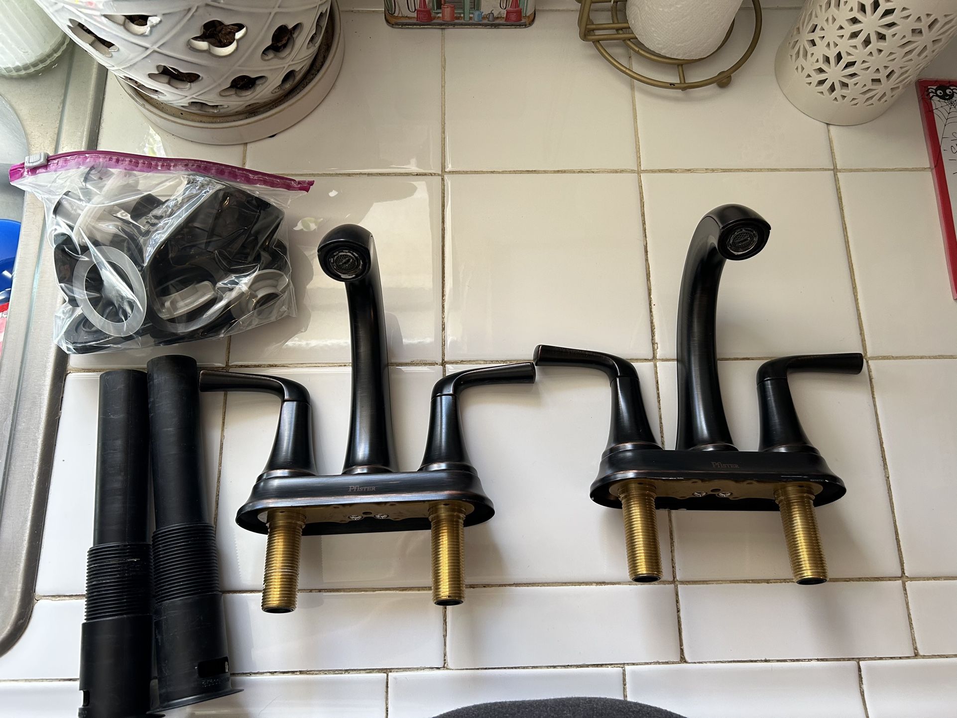 Two Pfister Bathroom Faucets