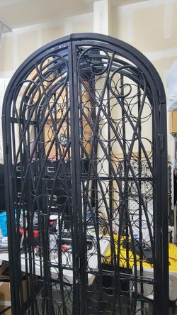 LARGE 100 BOTTLE BLACK METAL WINE CABINET. LIKE NEW.