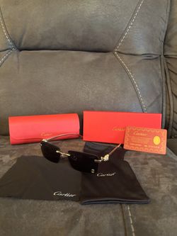 Cartier Black And Gold Rimless Shield Sunglasses