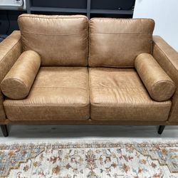 Telora Faux Leather Caramel Loveseat