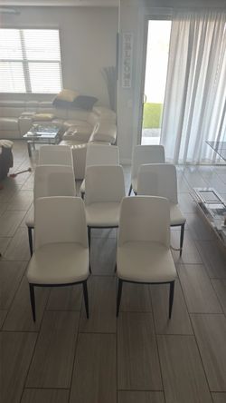 Set of 8 white dining room chairs