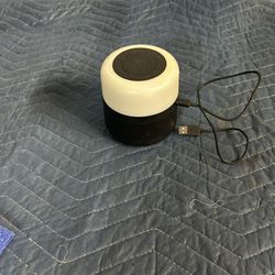 Portable speaker turn lights on
