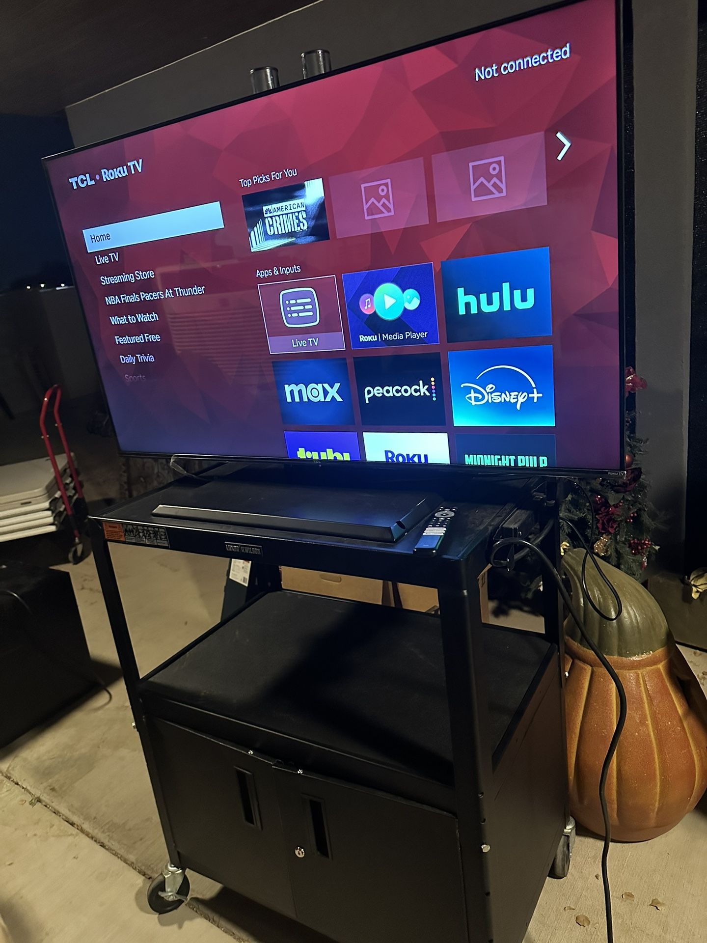 50’’ ROKU TLC TV WITH ROLLING CART USED