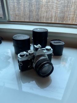 Olympus OM-1 with lenses