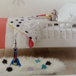 Cute Toddler  Reversable Comforter-New In Package. For Toddler Bed I have 2 of them $15 each or both for $25